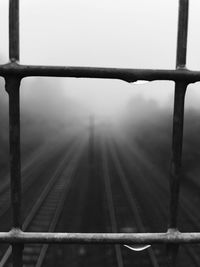 Close-up of railroad track against sky