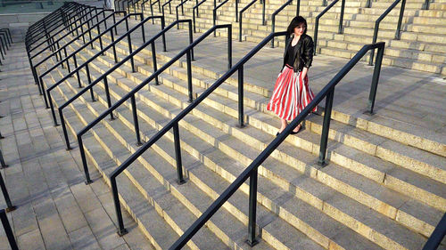 Full length of man on railing