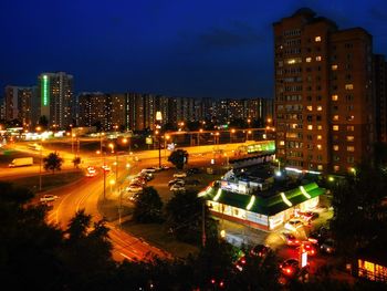 High angle view of illuminated cityscape at night