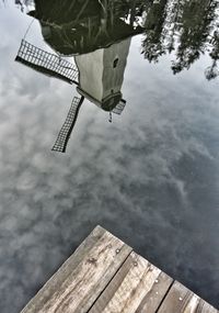 Low angle view of kite flying against sky