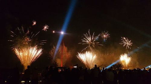 Firework display at night