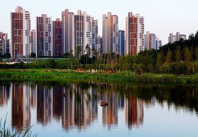 Reflection of buildings in lake