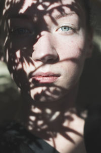 Close-up portrait of young woman