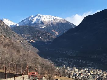 Scenic view of snowcapped mountains against sky