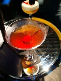 High angle view of wine in glass on table