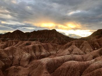Scenic view of landscape against sky during sunset
