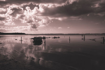 Scenic view of sea against sky at sunset