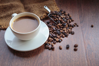 High angle view of coffee cup on table