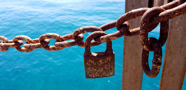 Close-up of padlock on chain