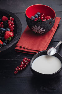 High angle view of strawberries in bowl on table