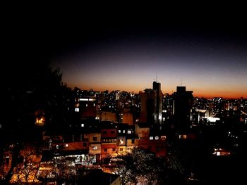 Illuminated cityscape at night