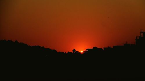 Scenic view of dramatic sky during sunset