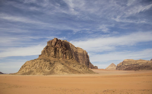 Rock formations in desert against sky