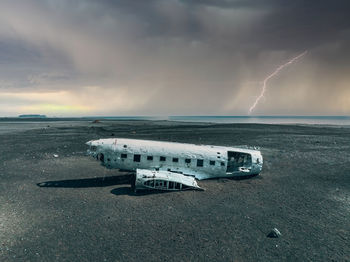 Aerial view of the old crashed plane abandoned on solheimasandur beach near vik,iceland.