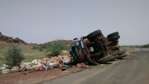 Abandoned truck on landscape against sky