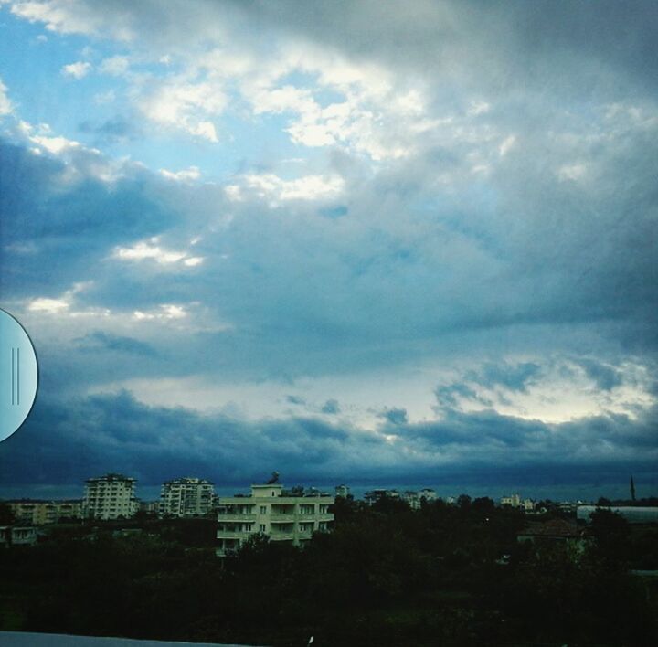 sky, cloud - sky, architecture, built structure, building exterior, cloudy, cloud, city, tree, nature, outdoors, cityscape, day, scenics, weather, sea, residential building, no people, beauty in nature, building