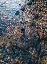 High angle view of stones on beach