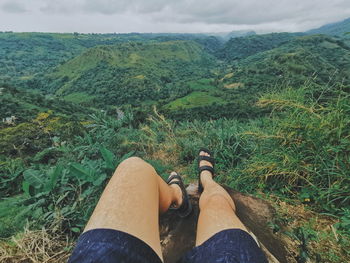 Low section of person legs on land