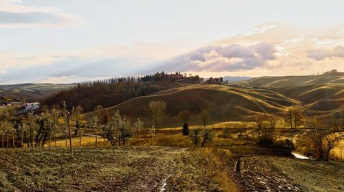Scenic view of landscape against sky during sunset
