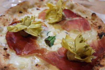 Close-up of pizza served in plate