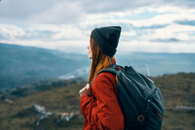 Rear view of man looking at mountain