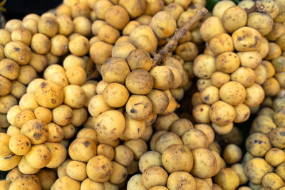 High angle view of onions for sale at market stall