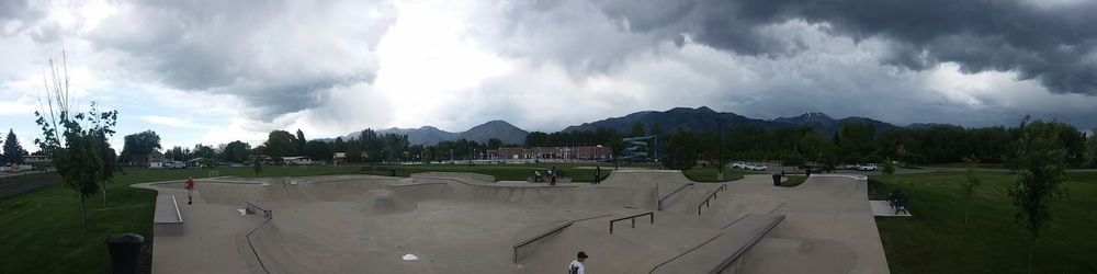 Scenic view of mountains against cloudy sky