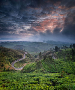 Scenic view of landscape against sky during sunset