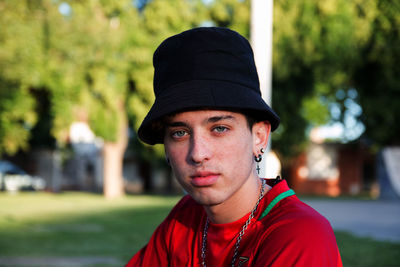 Portrait of young man wearing hat