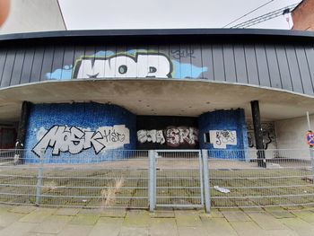 Low angle view of graffiti on building wall