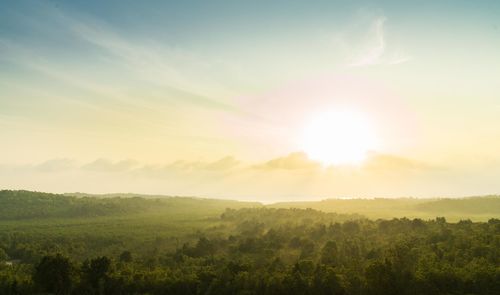 Scenic view of landscape against sky during sunset