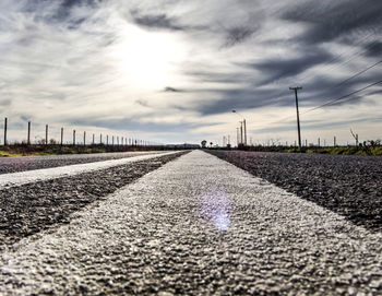 Surface level of road against sky