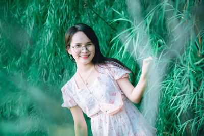 Portrait of young woman smiling