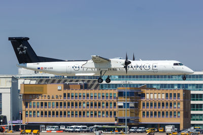 Low angle view of airplane flying against clear sky