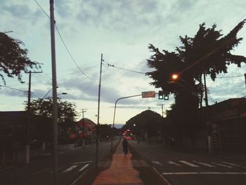 View of road against cloudy sky