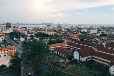 Aerial view of town against sky