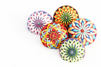 Close-up of multi colored white background