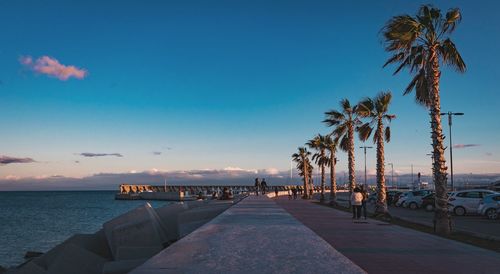 Scenic view of sea against blue sky