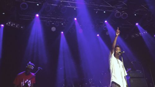 Group of people enjoying at concert