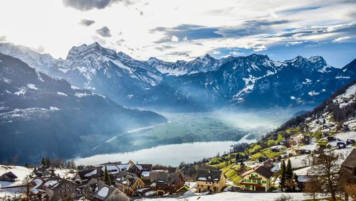 Scenic view of snowcapped mountains against sky