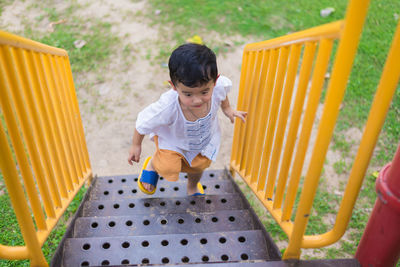High angle view of boy playing on playground