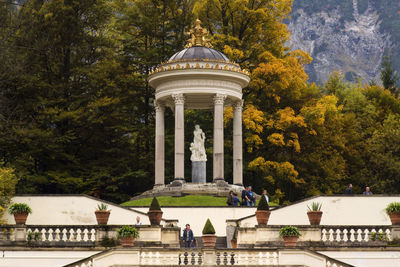 Statue in front of historical building