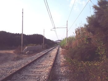 Railroad tracks against sky