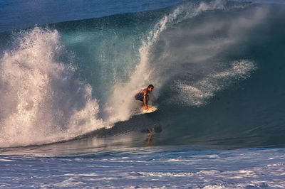 Man surfing in sea