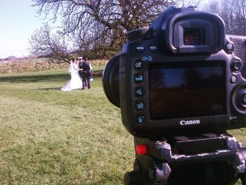 Woman photographing through camera