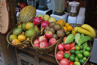 Fruits in basket on market stall