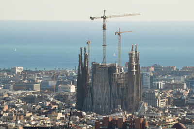 Aerial view of cityscape against clear sky