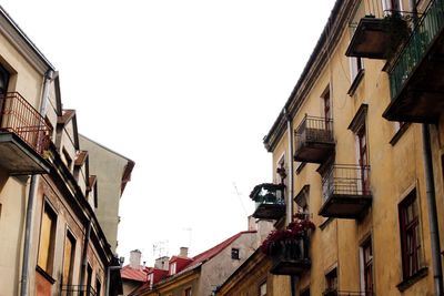Low angle view of residential buildings against clear sky