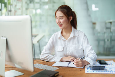 Businesswoman working at office