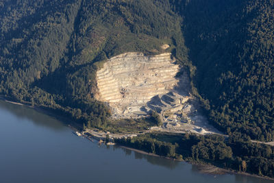 High angle view of lake by mountain